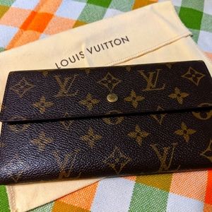Louis Vuitton Porte Trésor Monogram trifold wallet